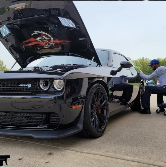 Detailing a black Dodge Challenger Hellcat with the hood up